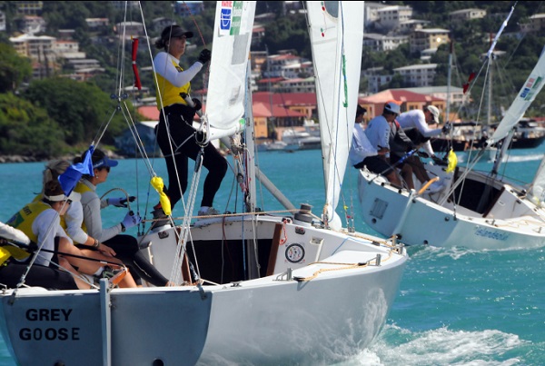 Brazil’s Juliana Senfft and team trail the USVI’s Peter Holmberg and crew in a match during the 2012 Carlos Aguilar Match Race. Credit: Dean Barnes
